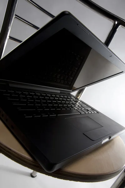 Laptop on a chair — Stock Photo, Image