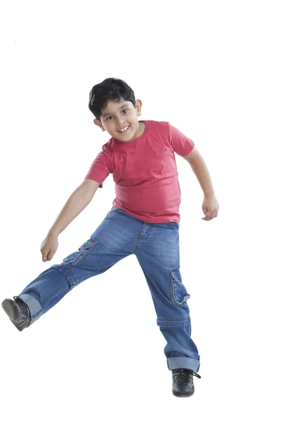 Boy jumping in the air — Stock Photo, Image