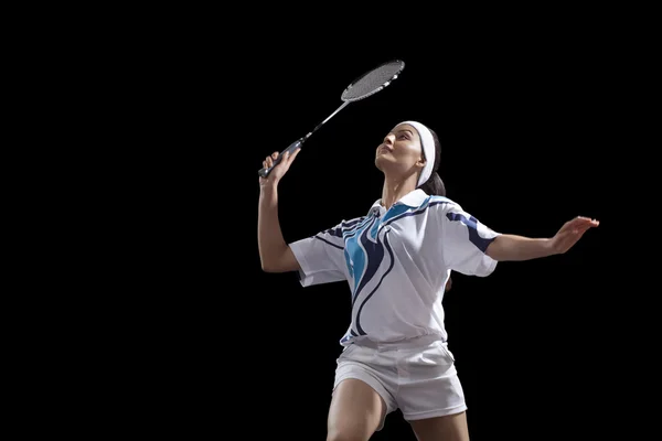 Young woman holding badminton racket — Stock Photo, Image