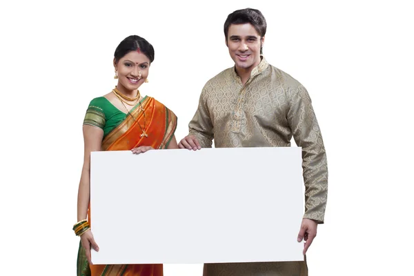Maharashtrian couple holding a placard — Stock Photo, Image