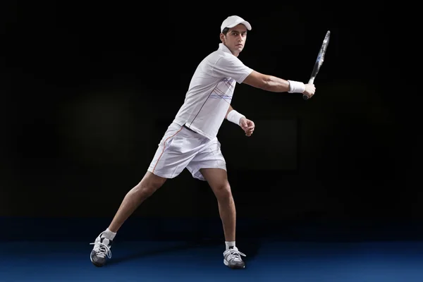 Man in sportswear playing tennis — Stock Photo, Image