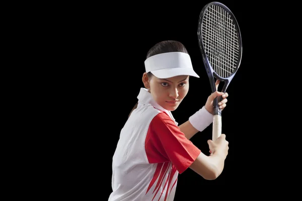 Jeune femme tenant raquette de tennis — Photo