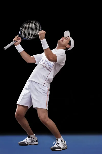 Happy tennis player celebrating victory — Stock Photo, Image