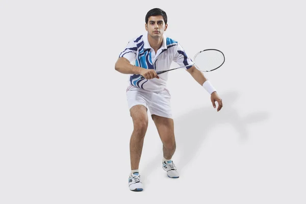 Joven jugando al bádminton — Foto de Stock