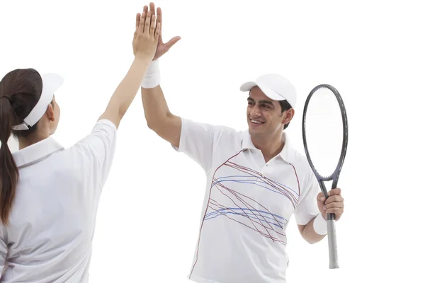 Tennis players making high five — Zdjęcie stockowe