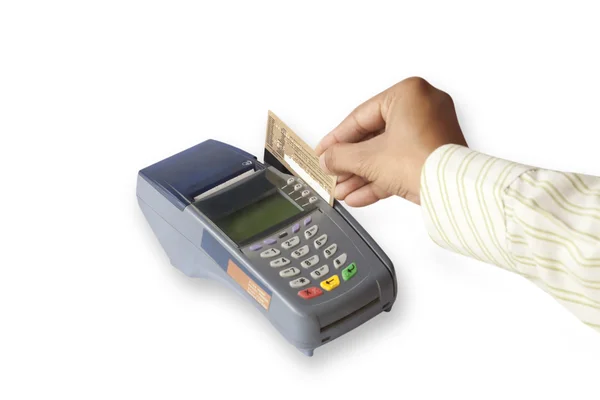 Mão deslizando cartão de crédito — Fotografia de Stock
