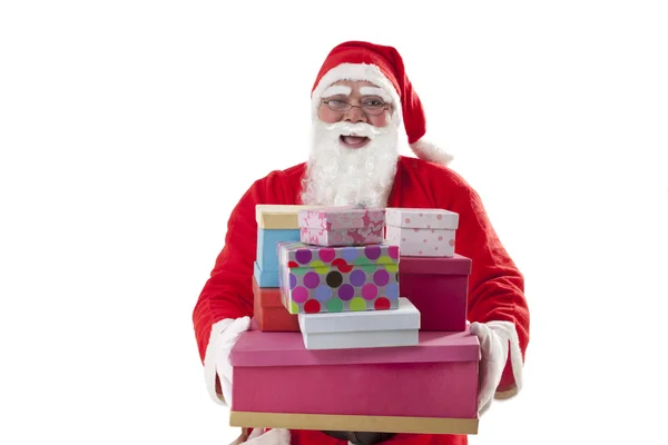 Santa claus przewożące prezenty — Zdjęcie stockowe