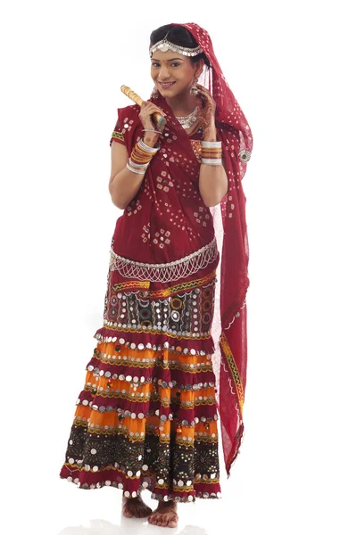 Female dandiya dancer with sticks — Stock Photo, Image