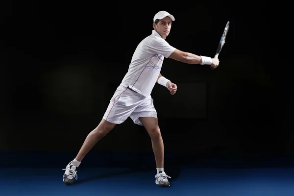 Young man playing tennis — Stock Photo, Image