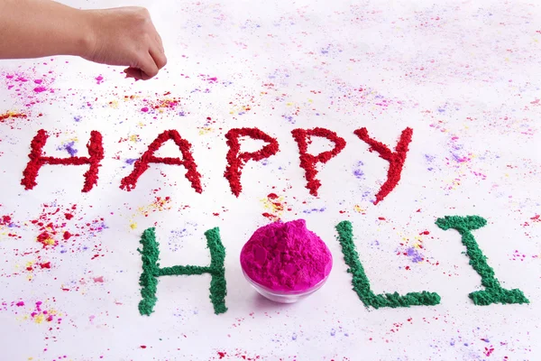 Happy Holi escrito em rangoli — Fotografia de Stock