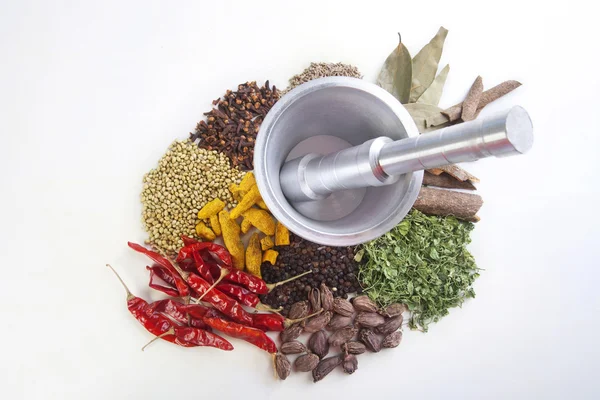 Spices with mortar and pestle — Stock Photo, Image