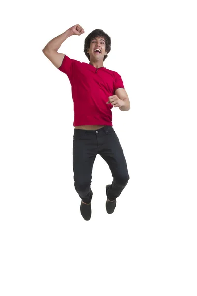По всей длине молодой человек аплодирует и прыгает — стоковое фото