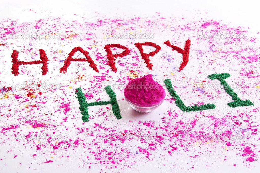 Happy Holi written on rangoli