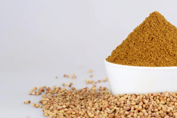 Coriander seed in white bowl on the white background — Stock Photo, Image