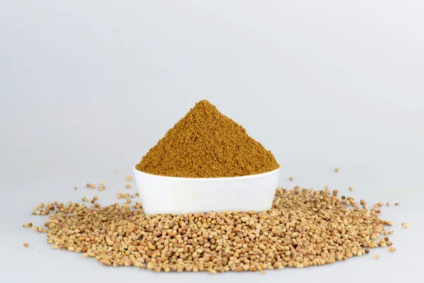 Coriander seed in white bowl on the white background — Stock Photo, Image