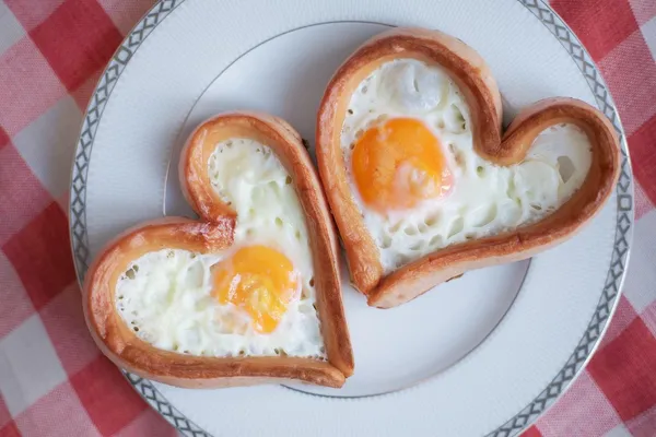 Breakfast in the shape of a heart Stock Picture