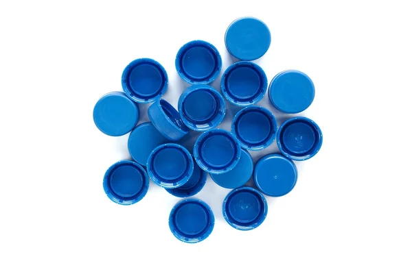 Tapas de plástico azul de botellas Fotos de stock libres de derechos