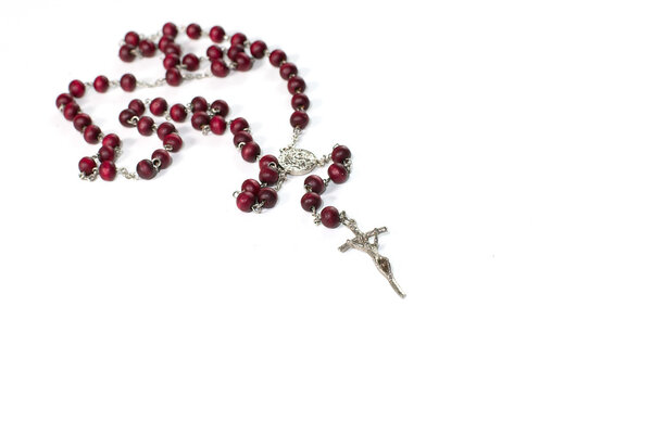 Rosary on white background