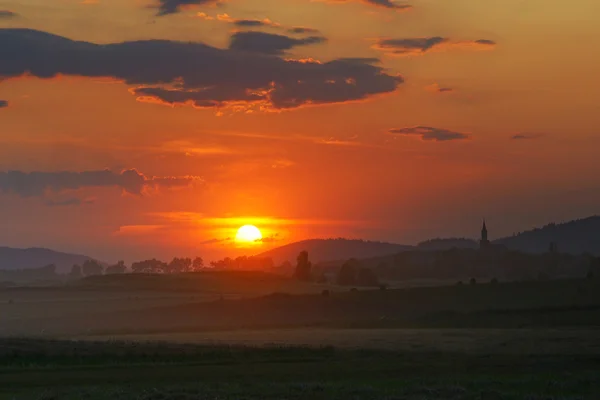 Solnedgång på polska provinser. — Stockfoto