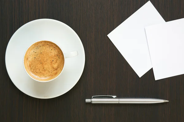 Coffee, pen and notebook. Stock Photo