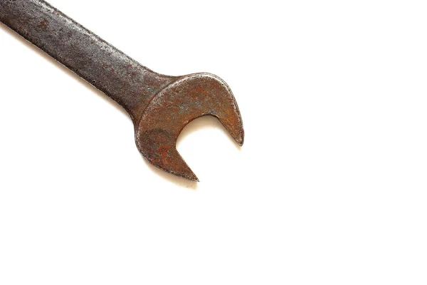 Old rusty wrench on the white background. — Stock Photo, Image