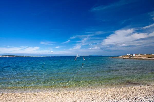 Croatian beach in the area of Premantura. — Stock Photo, Image