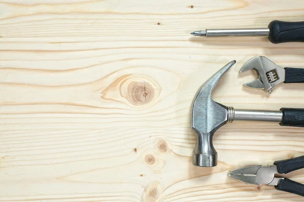 Tools on a wooden background — Stock Photo, Image