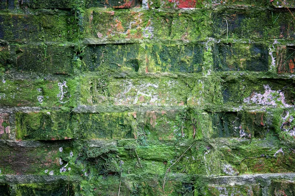 Hintergrund die alte zerstörte Mauer — Stockfoto