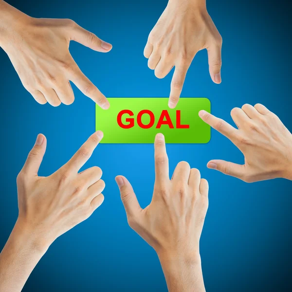 Pulsante Goal con mano reale su sfondo blu — Foto Stock