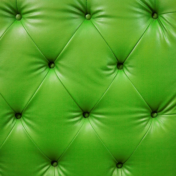 Close up luxury buttoned green leather — Stock Photo, Image