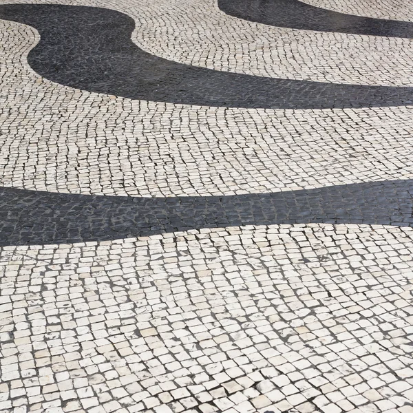 Svart och beige vintage torget mosaik kullersten trottoar med — Stockfoto