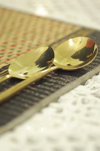 Close up gold spoon on dining table restaurant — Stok fotoğraf