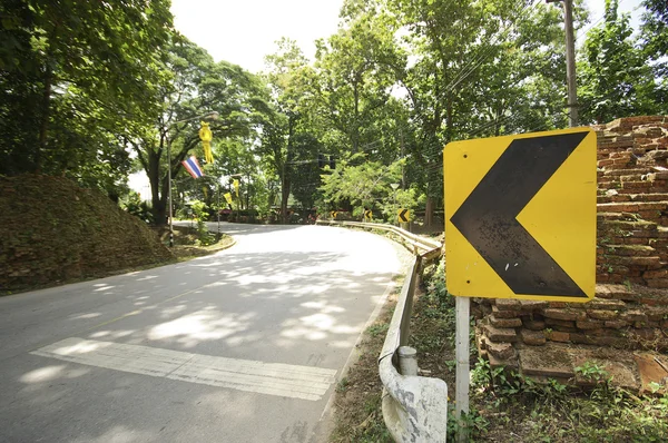 Left sign on the conner road — Stock Photo, Image