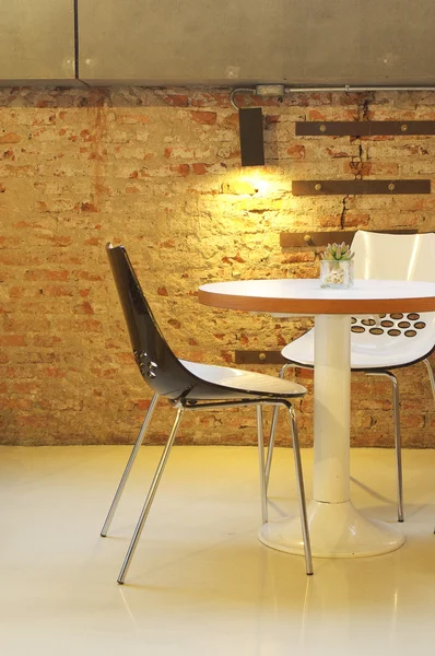 Chair and table in lobby — Stock Photo, Image