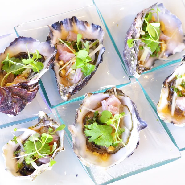 Opened oyster food on dish — Stock Photo, Image