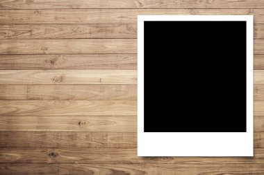 Photo frame on Brown wood plank wall texture background clipart