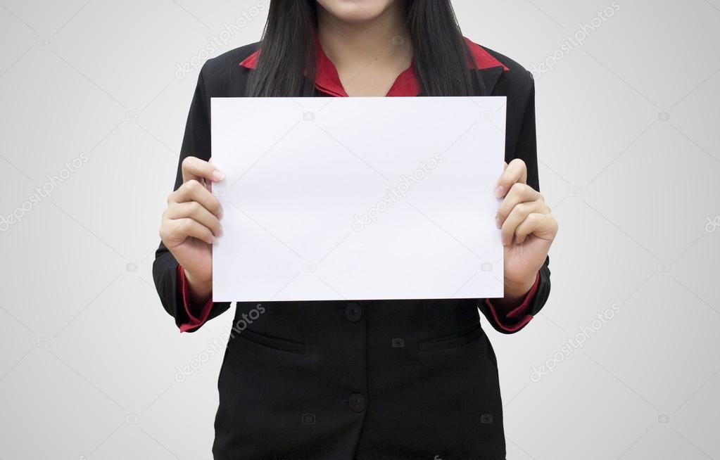 Business woman hold white blank paper. Young girl show blank boa