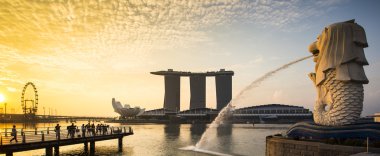 Singapore landmark Merlion with sunrise Panorama clipart
