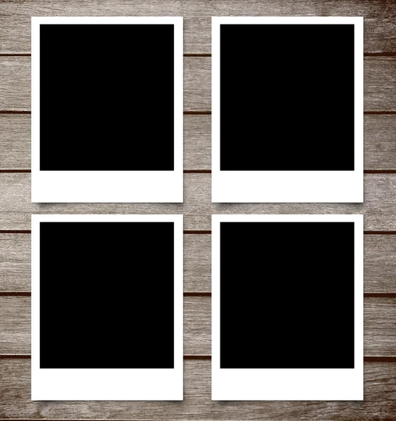 Blank photo frame on brown wood plank background — Stock Photo, Image