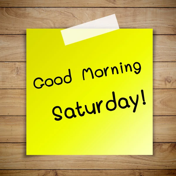 Günaydın Cumartesi günü yapışkan kağıt üzerinde kahverengi ahşap duvar t plank