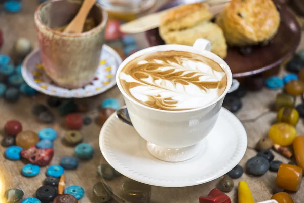 Latte coffee on table coffee shop — Stock Photo, Image