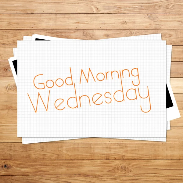 Good Morning Wednesday on paper and Brown wood plank background — Stock Photo, Image