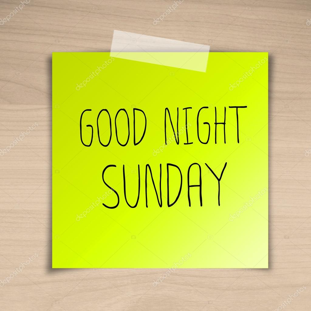 Good night sunday sticky paper on brown wood background texture ...