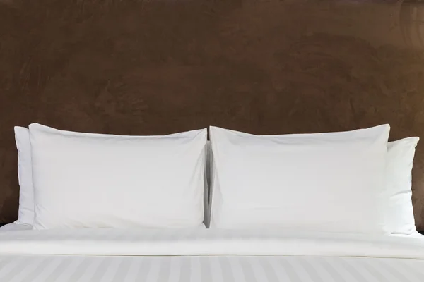 Bed in a hotel room at night — Stock Photo, Image