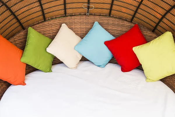 Colorful Pillow on hotel bed with space for text — Stock Photo, Image