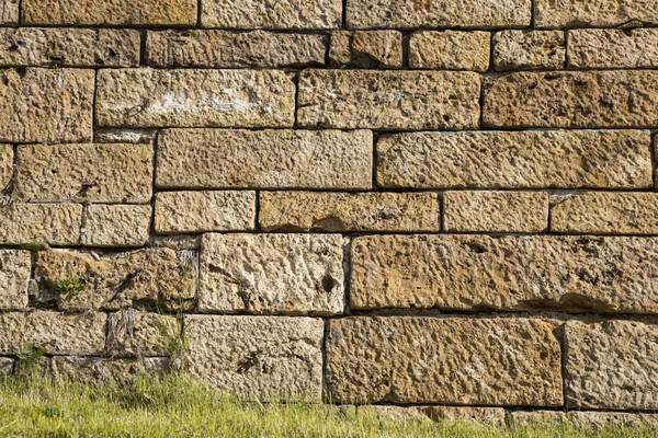 Gran pared de piedra de arena marrón textura y fondo — Foto de Stock
