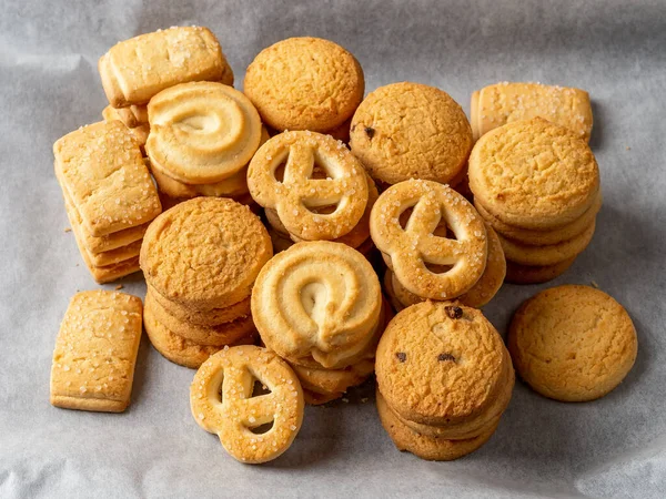 Stacked Crispy Butter Biscuits White Baking Parchment Variety Shortbread Cookies — Stock Photo, Image