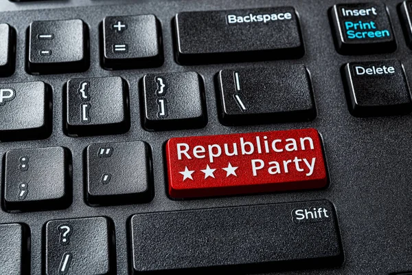 Republican Party red key on a decktop computer keyboard. Concept of voting online for Republican Party, politics, United States elections. Laptop enter key with Republican Party word message. Top view.