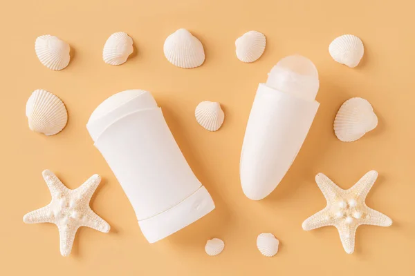 Roll Antiperspirant Solid Deodorant Sea Stars Shells Pastel Orange Background — стоковое фото