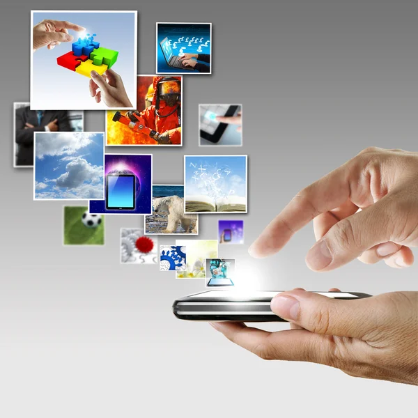Hand holds touch screen mobile phone streaming images — Stock Photo, Image